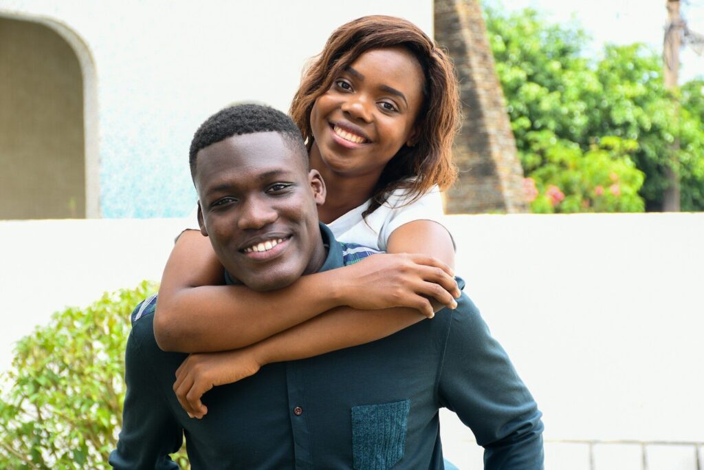 a woman hugging a man